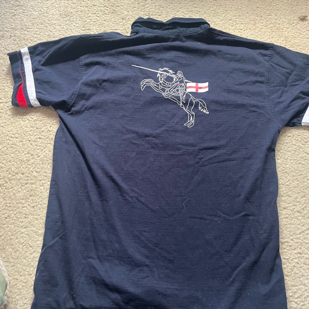 Navy Polo with Embroidered Knight Design